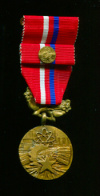 Mедаль "За заслуги в развитии Социализма". Чехословакия
