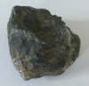 Осколок метеорита. (Предположительно)
Вес 2,14 кг, размер ок. 10х10х7 см.
Состав Fe, Cr
Найден на торфоразработках в Псковской области